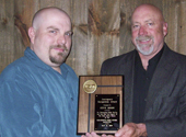 John O'Connor, Parole Supervisor in Framingham, presents former Advocates' employee Steve Bisson an award on behalf of the Massachusetts Parole Officers Association